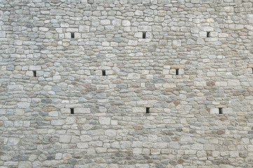 Old grey stone wall background texture
