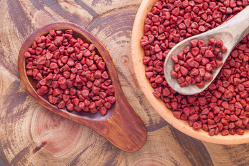 Seeds of achiote, originating from central america and parts of south america is used to season and color food