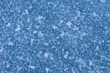 Fototapeta na wymiar Texture of the ice surface. Winter background