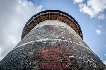 Brick wall wit stones. Joan of Arc Prison Tower