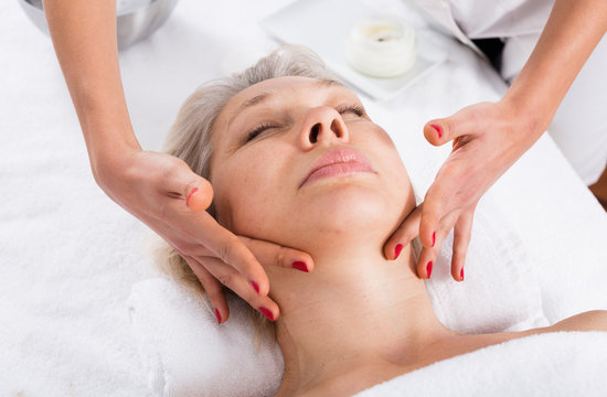 Mature Woman Having Face Massage