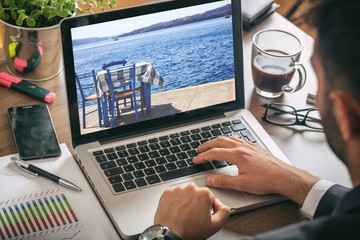 Man at work planning vacations