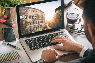 Man at work planning vacations