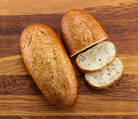 Loaf of wholegrain white bread and slices