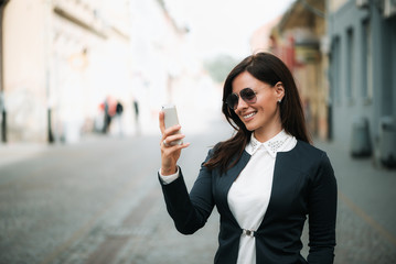 Fototapeta premium Using mobile outdoors