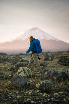 Man hiking, looking at view of mountain peak, Ecuador, South America