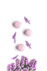 spring woman breakfast with macaroons and flowerstop view space for text