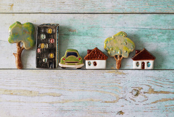 toy landscape, toy houses, trees, cars