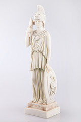 Fototapeta na wymiar Statue of Athena on a white surface. Statue isolated on white background.