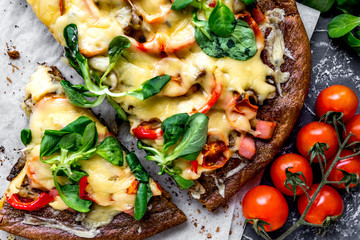 cooking pizza with vegetables and cheese on stone desk background top view