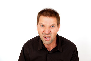 Obraz premium A young man screaming in fury