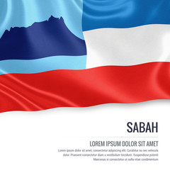 Fototapeta premium Sabah flag. Flag of Malaysian state Sabah waving on an isolated white background. State name and the text area for your message. 3D illustration.