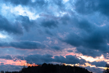 sunset over a hill top - silhouette