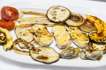 nutritious fish with vegetables on plate