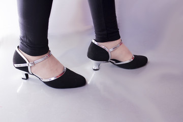 Feet of adult woman. Salsa dancer