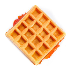 Square waffle with filling. Isolated