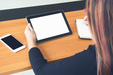 Teenage freelance working business on tablet.