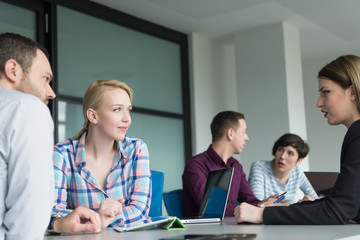 Business Team At A Meeting at modern office building