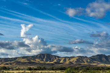 Mountains Under Blue Sky and Clouds
