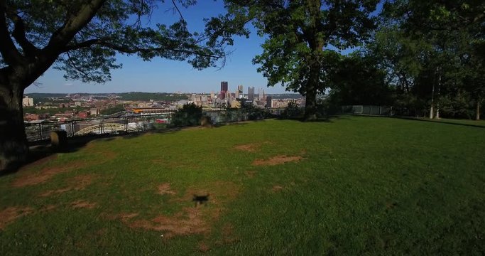 PITTSBURGH - Circa May, 2017 - A dramatic dolly forward view of the Pittsburgh, PA skyline as seen from the West End Overlook.	 	