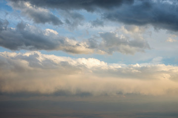 Dramatic view of sky with clouds at sunset