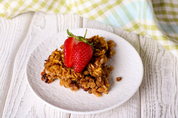 Baked oatmeal with nuts and strawberry