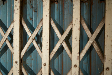 Folding old metal door