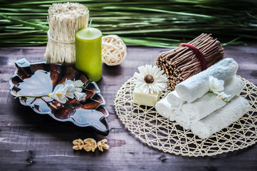 Accessories for spa.  White towels, orchid and stones for spa