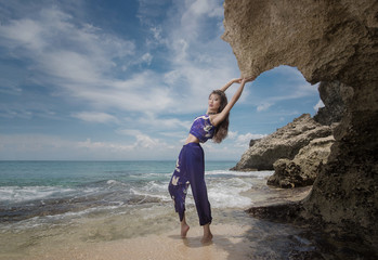 Elegant girl, model in a beautiful image by the sea.