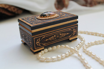 casket and necklace