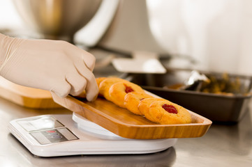 preparing delicious christmas cookies in a bakery store