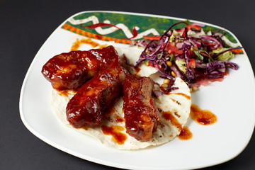 Pork ribs in Mexican style. Mexican food. Mexican cuisine.