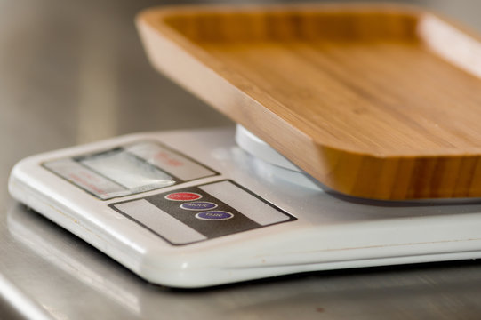 Useful Food scale digital on metallic background