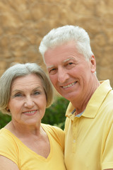 Happy elderly couple embracing
