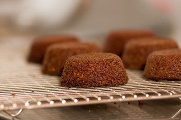 Delicious chocolate cake in a grating bakery