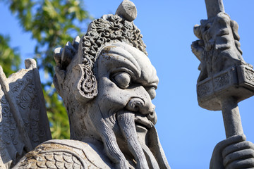 Fototapeta premium statue en pierre dans un temple en Thailande 
