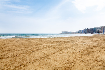 Empty beach of the sea in the spring.