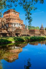 Fototapeta na wymiar Wat Mahathat Temple in the precinct of Sukhothai Historical Park, a UNESCO World Heritage Site in Thailand