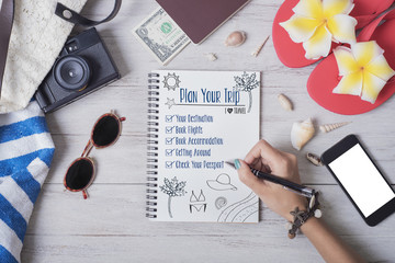 Summer Beach Fun vacation Concept.people list planner trip on notebook.
