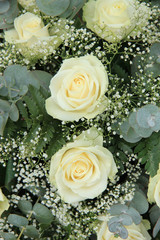 White roses in bridal bouquet
