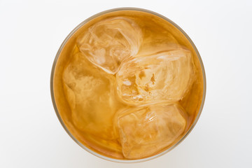 Glass of lemon ice tea isolated on white background. From top view