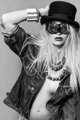 Sensual pop girl monochrome portrait wearing hat and butterfly glasses