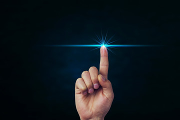 Hand pushing on a touch screen.