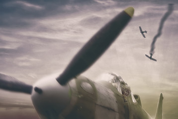 Air battle concept. Little girl in pilot glasses is playing in the WW2 airplane with propeller at...