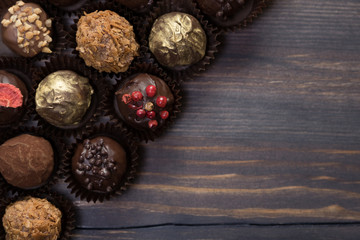 Truffles on wooden background