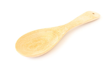 Empty wooden spoon on white background