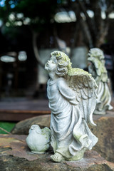 Fototapeta na wymiar sandstone angel statue / Statue angel