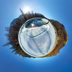 Spherical 360 180 panorama of a man on an ice melting river