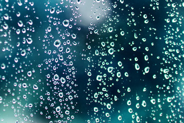 Fototapeta na wymiar Glass with drops of the rain