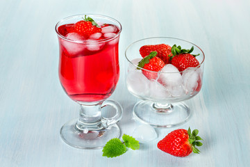 Alcohol cocktail with strawberry and mint